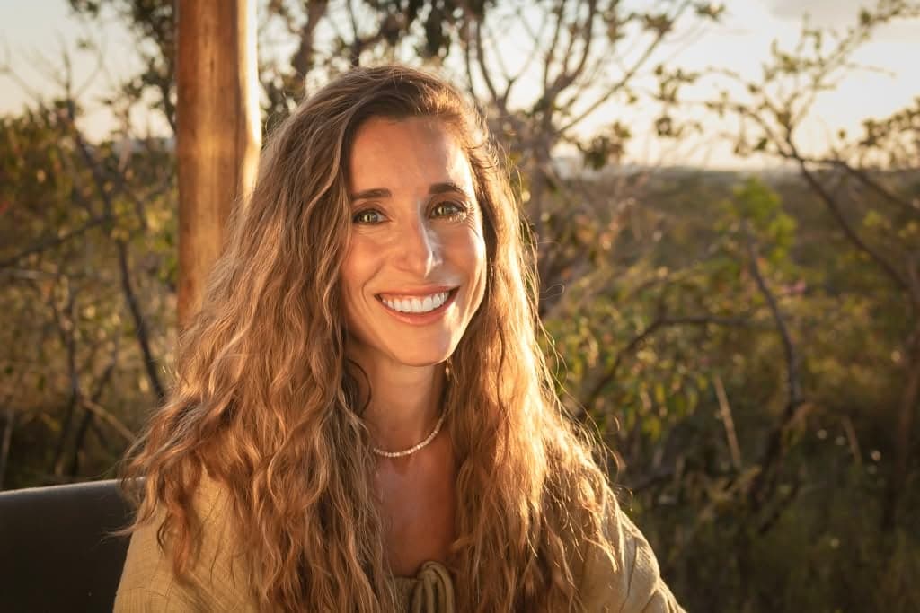 Me at golden hour, the sun behind my hair, laughing.